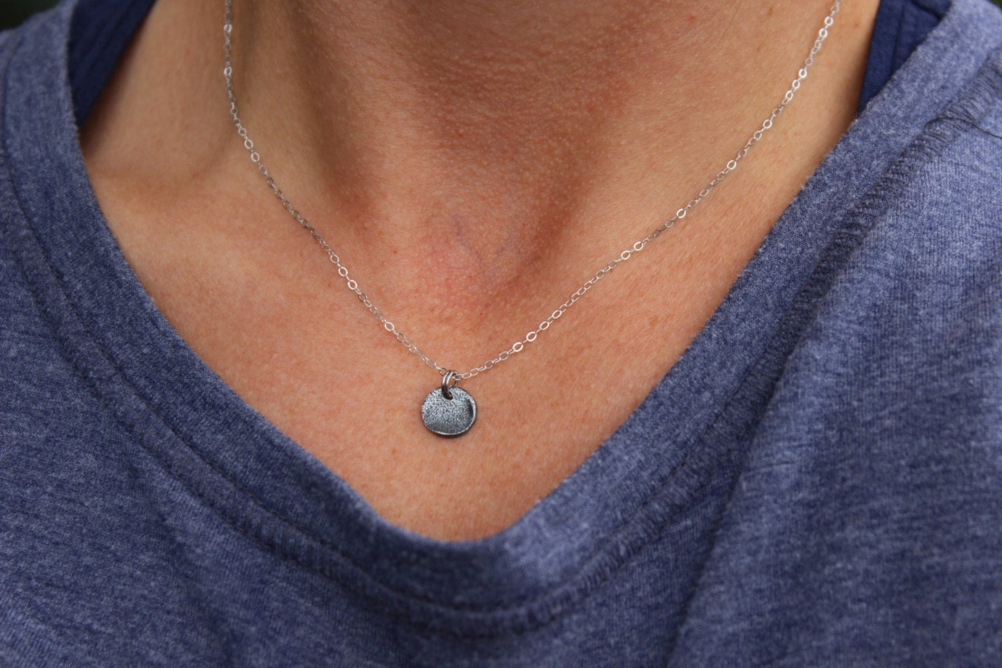 Tiny Portion of a Dog Paw Print Charm