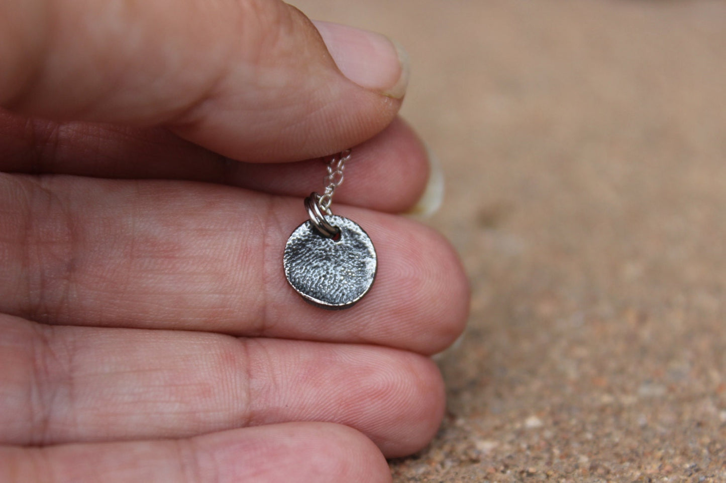 Tiny Portion of a Dog Paw Print Charm
