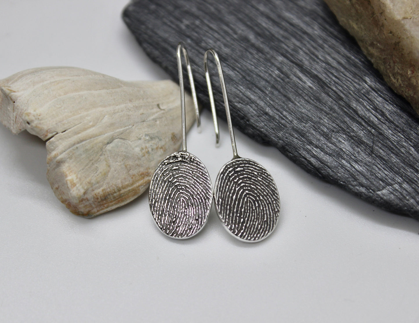 Drop down fingerprint earrings