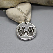 Two Hand Prints Charm in Sterling Silver